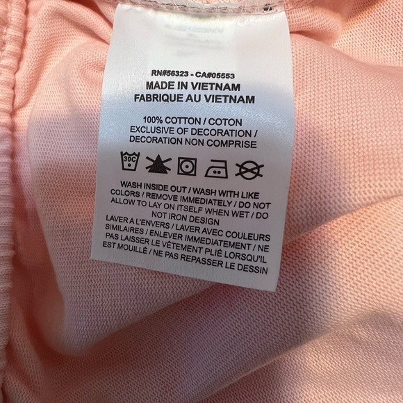 Nike loose fit shorts pink with white embroidered swoosh, 2 pockets NWT sz XL - Picture 8 of 8